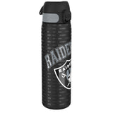 A black water bottle, featuring a repeating “RAIDERS JUST WIN” pattern and Raiders logo, stands on a white background.