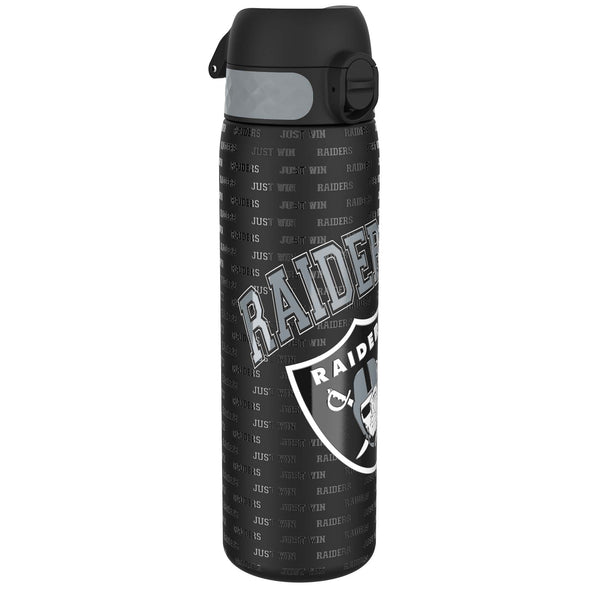 A black water bottle, featuring a repeating “RAIDERS JUST WIN” pattern and Raiders logo, stands on a white background.
