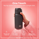 A dark-grey ION8 water bottle is held; its flip-top opens with a single click. A hand holds the bottle against a pink background; text highlights its one-handed operation, triple lock security, and leak-proof design. POD THERMAL is also shown.
