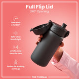 A dark gray water bottle, with a flip-top lid open to 240 degrees, is held by a person against a pink background. Full Flip Lid, 240° Opening. POD THERMAL.