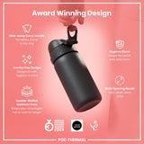 A black, double-walled stainless steel thermal bottle is being held, showcasing its features against a pink backdrop. Award Winning Design. GERMAN DESIGN AWARD WINNER 2024. GOOD DESIGN. 2021. POD THERMAL.