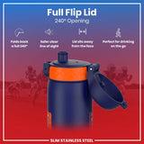 A dark-blue, slim stainless steel water bottle with an orange accent, featuring a 240° flip lid that folds back, sits away from the face, and is shown against a blurred background of football players on a field.