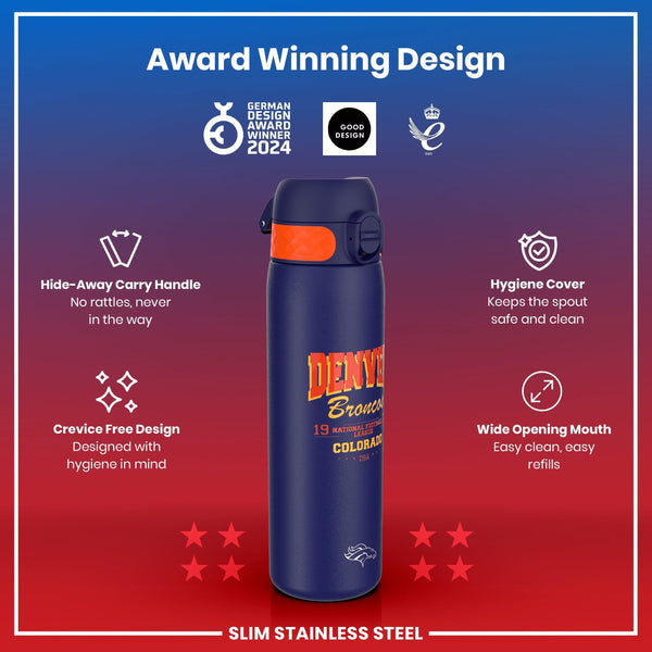 A navy blue, slim stainless steel water bottle, featuring a Denver Broncos design, is displayed against a red background. It has a hide-away carry handle, crevice-free design, hygiene cover, and wide opening mouth. The bottle is labeled as an award-winning design.