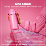 A pink ION8 water bottle is held; its flip top opens one-handed. The bottle is shown against a pink background with pink fabric. 
