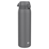 A dark gray water bottle stands upright against a white background. The bottle has a screw-on lid with a carrying loop. The brand 