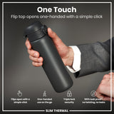 A dark gray, cylindrical thermal bottle is held; its flip top opens one-handed. The bottle is advertised as 