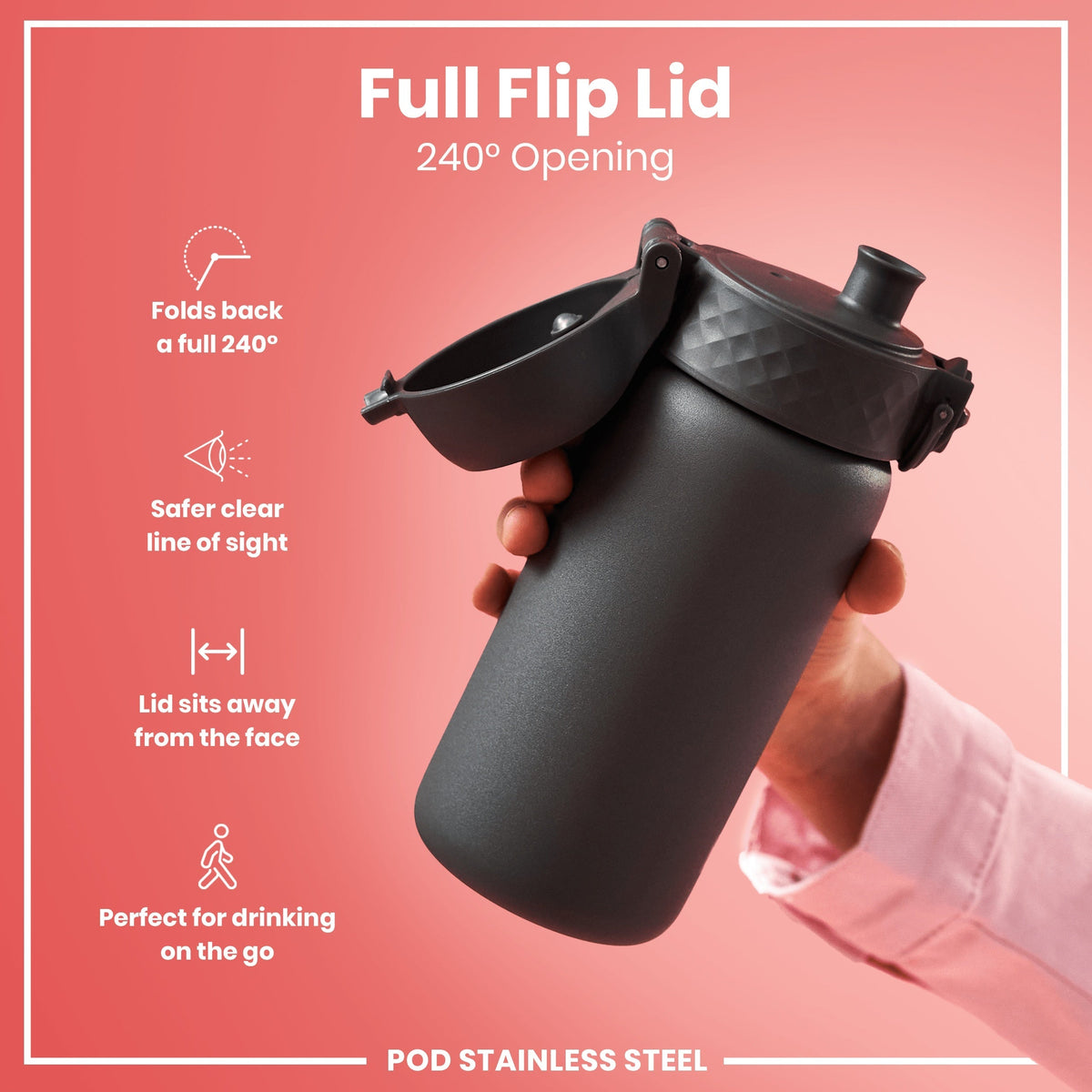 A dark gray stainless steel water bottle with a full flip lid, being held, against a pink background. The lid folds back 240°.