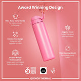 A pink, double-walled stainless steel water bottle is being held; it features a hide-away carry handle, crevice-free design, hygiene cover, and wide opening mouth. Award-winning design, 2024.
