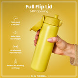 A yellow, slim thermal water bottle, with a 240° opening full flip lid, is held by a hand against a yellow background. Full Flip Lid, 240° Opening, SLIM THERMAL.