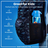 A blue water bottle, fitting school bags, is shown in a side pocket of a dark backpack with a shark pattern. Great for Kids. Perfect size for school bags and lunch boxes. 600ml/20oz. 232 x 65 mm. Backpack friendly. Fits cup holders. 100% leak proof. SLIM STAINLESS STEEL.