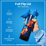 A slim stainless steel water bottle, with a full flip lid, is being held against a bright blue background. The lid provides a 240° opening. The bottle features a playful design. Full Flip Lid 240° Opening. SLIM STAINLESS STEEL.