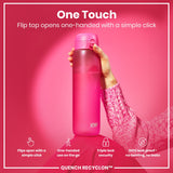 A pink ION8 water bottle is being held. Its flip top opens one-handed. The background is pink. 