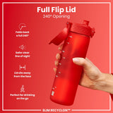 A red water bottle with a flip lid is being held. The lid opens 240 degrees. The bottle is against a red background. SLIM RECYCLON™ is printed on the bottle.