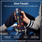 A dark-blue water bottle, featuring a giraffe design, is held; its flip top opens with a single click. The context is a person's hand, against a blue background. 