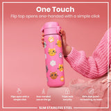 A pink water bottle, with a flip top and cat designs, is held by a hand. The bottle's top opens one-handed. It features a triple lock security system and is leakproof. The bottle is made of slim stainless steel.