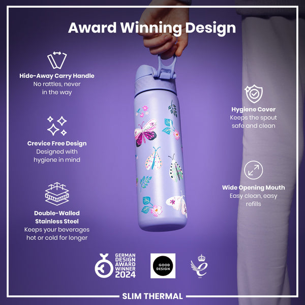 A lilac, butterfly-patterned water bottle is held; its features include a hide-away handle, crevice-free design, wide mouth, and double-walled stainless steel construction. It's an award-winning design.