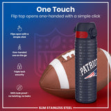 A water bottle, featuring a flip top that opens one-handedly, rests beside an American football. The bottle is dark-colored with 