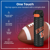 A black and orange Bengals-themed water bottle rests near an American football. Its flip top opens one-handed; it's leak-proof and has triple lock security. The background features a stylized NFL logo.