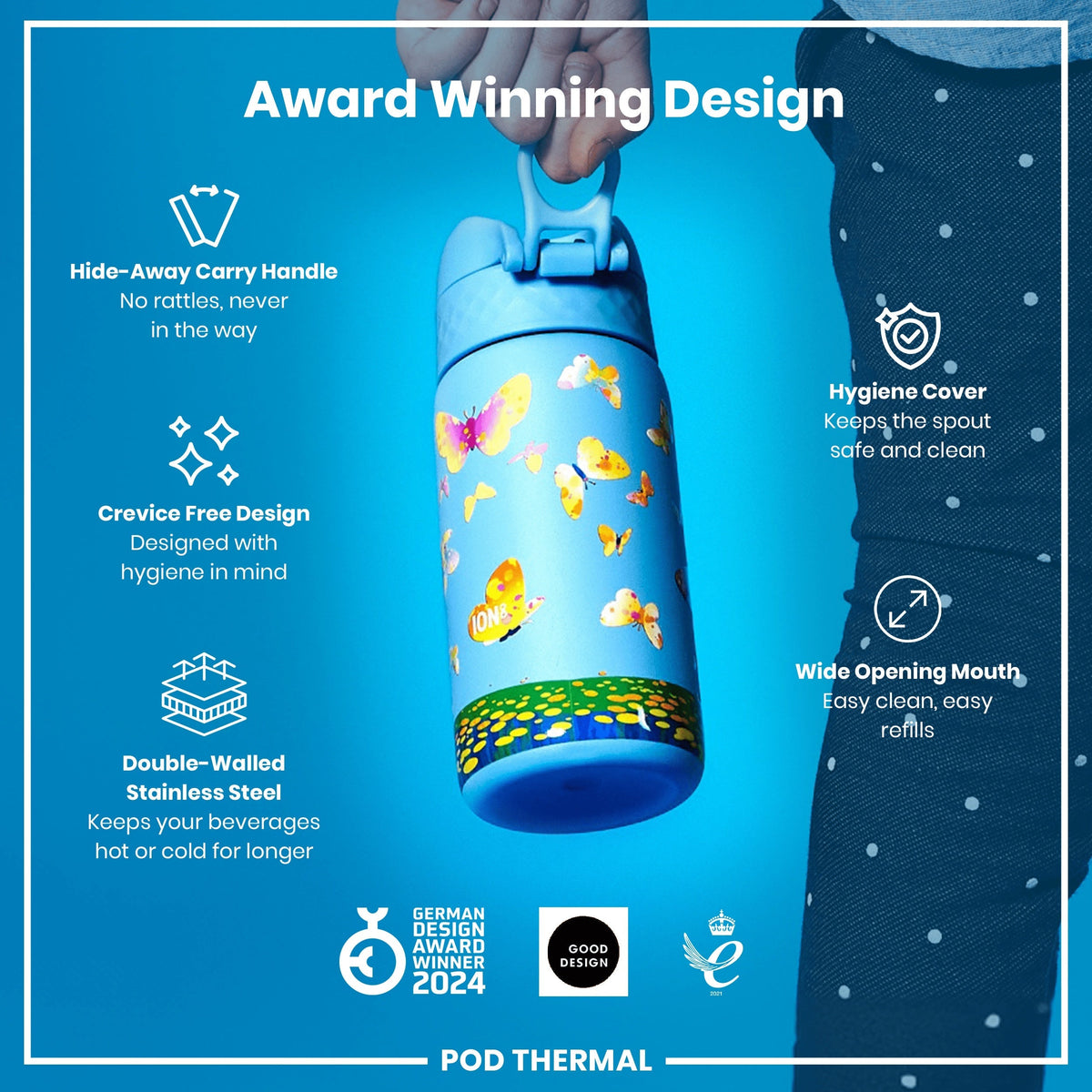 A light blue, butterfly-patterned water bottle is being held. Its features include a hide-away handle, crevice-free design, double-walled stainless steel construction, hygiene cover, and wide mouth. It's an award-winning design.