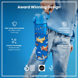 A blue water bottle with airplane graphics is being held. Its features include a hide-away handle, hygiene cover, and wide mouth. It's an award-winning design.