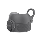 Gray water bottle lid with a flip-top spout and a handle loop rests against a plain white background