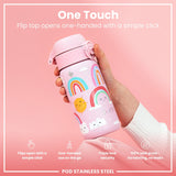 A pink, rainbow-decorated water bottle is held; its flip top opens one-handed. The bottle is made of stainless steel; it’s leakproof and has triple lock security. The background is pink.