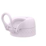 A lavender-colored lid, featuring a carrying loop and a textured base, rests on a white background. The top shows a small, indented circle. Part of the word 