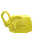 A yellow lid with a carrying loop sits on a white background. The lid has a textured base and the word 