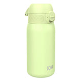 A pale green water bottle stands upright with a flip-top lid secured by a latch. The word 