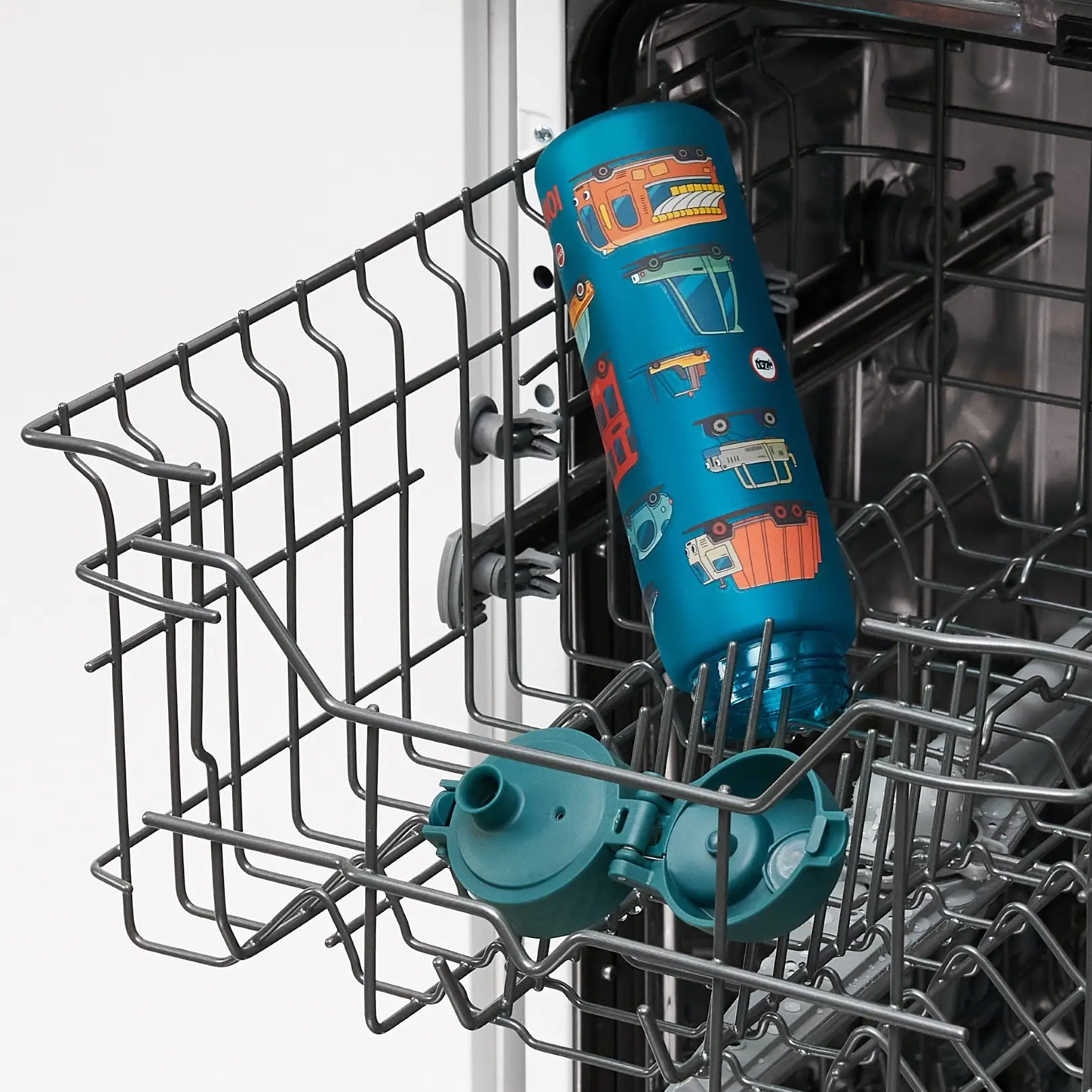 A water bottle with a vehicle pattern is being cleaned inside a dishwasher.